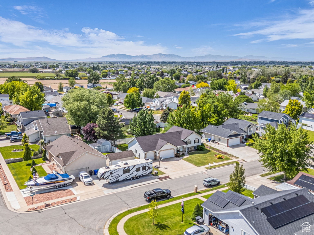 Aerial view of residential area with mountains