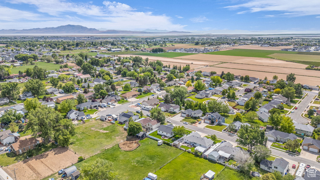 Aerial view of residential area with a mountain backdrop