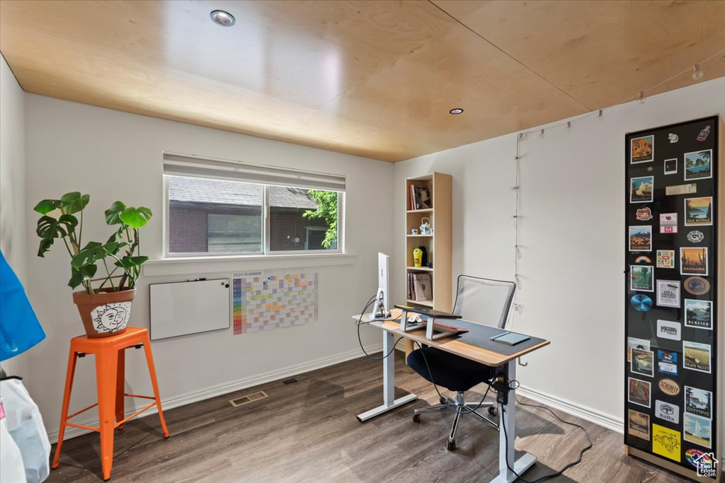 Office featuring wood finished floors, baseboards, and recessed lighting