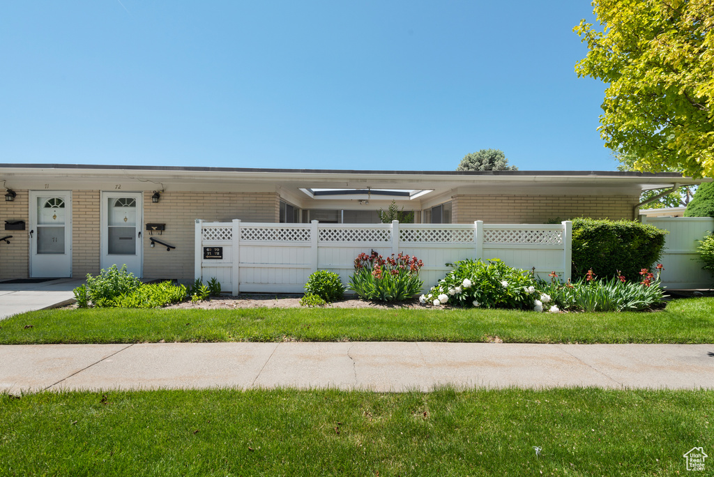 View of front of home with brick siding