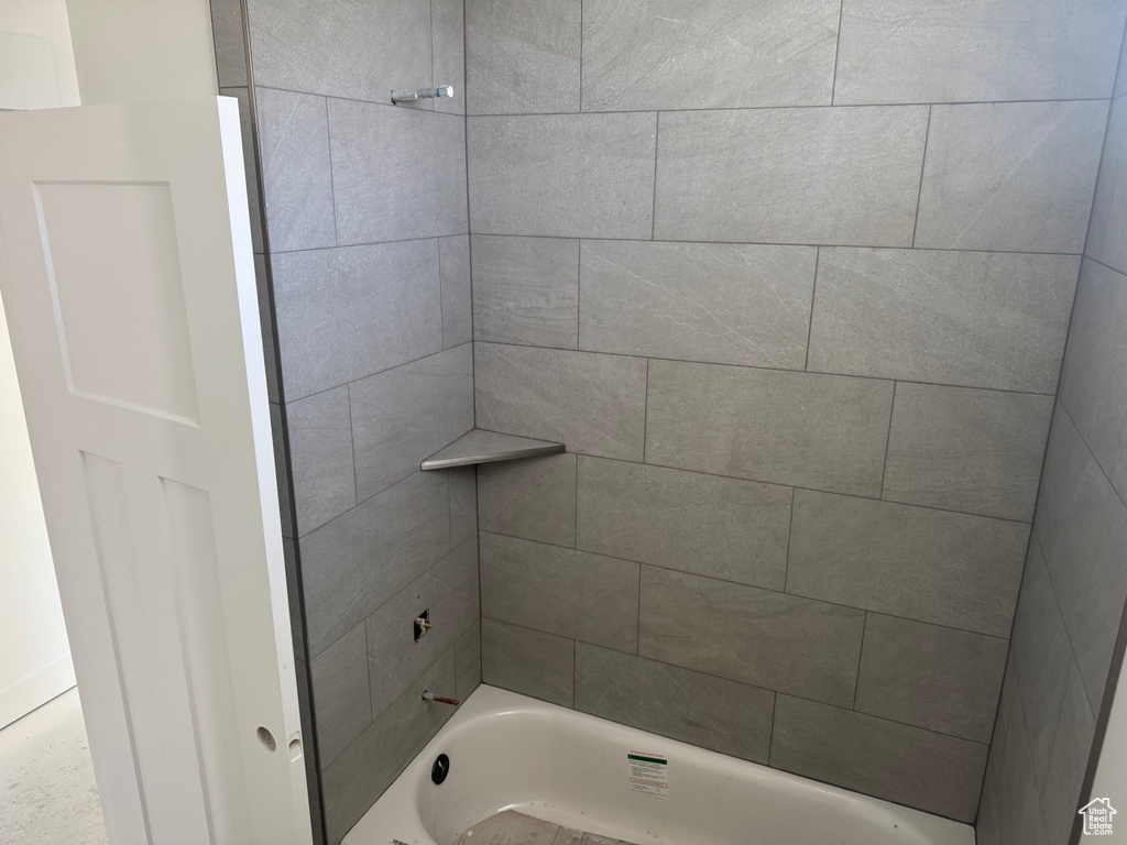 Full bathroom featuring tub / shower combination