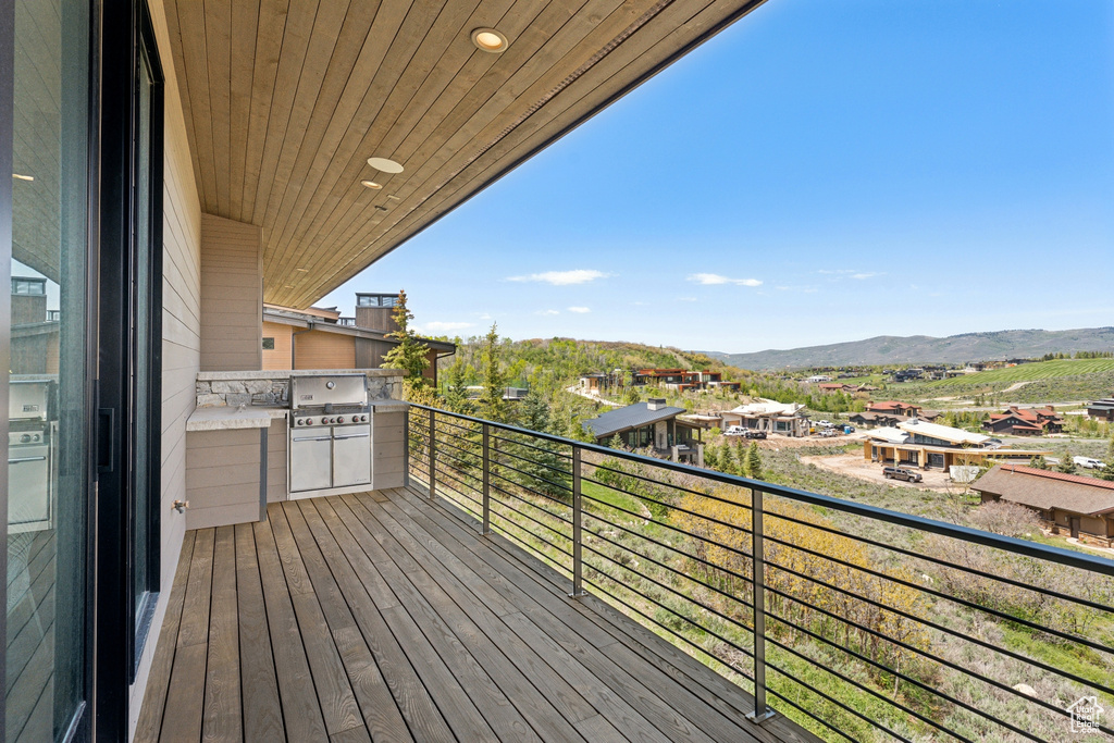 Balcony featuring a grill and a mountain view