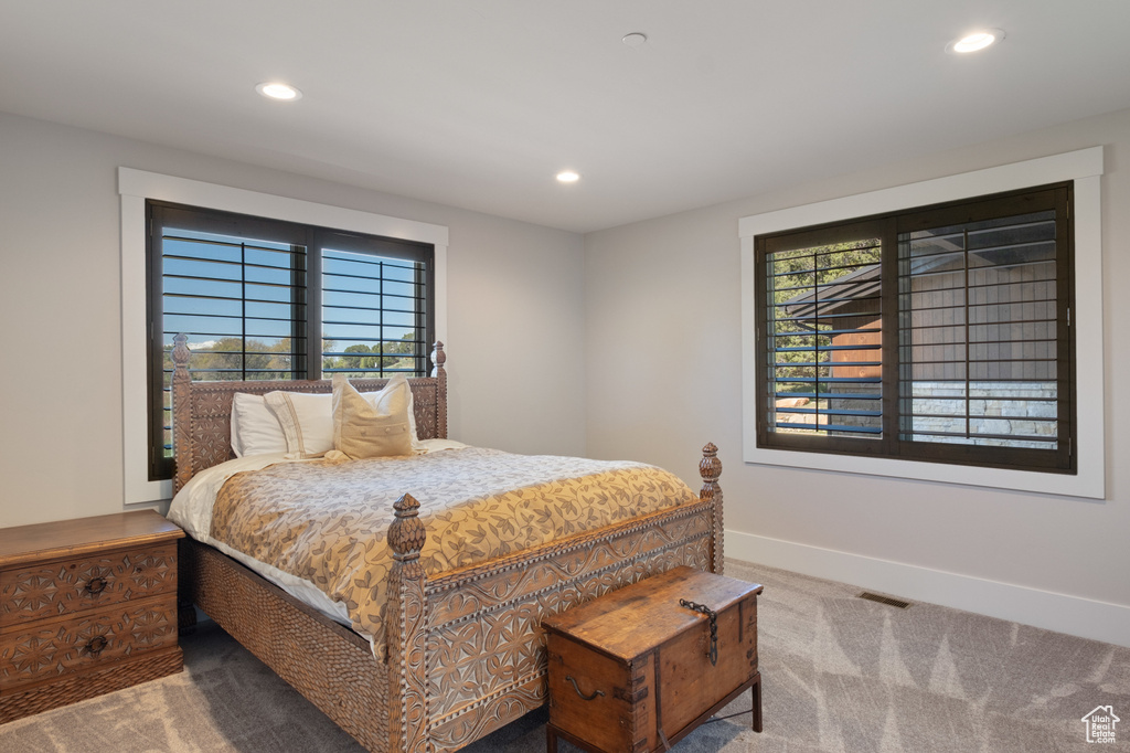 Bedroom featuring carpet floors, recessed lighting, and baseboards