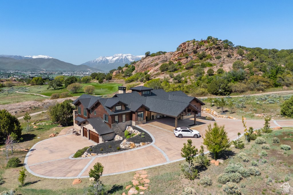 View from above of property featuring a mountainous background