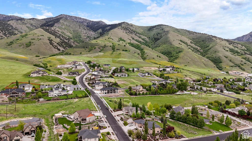 Mountain view featuring nearby suburban area