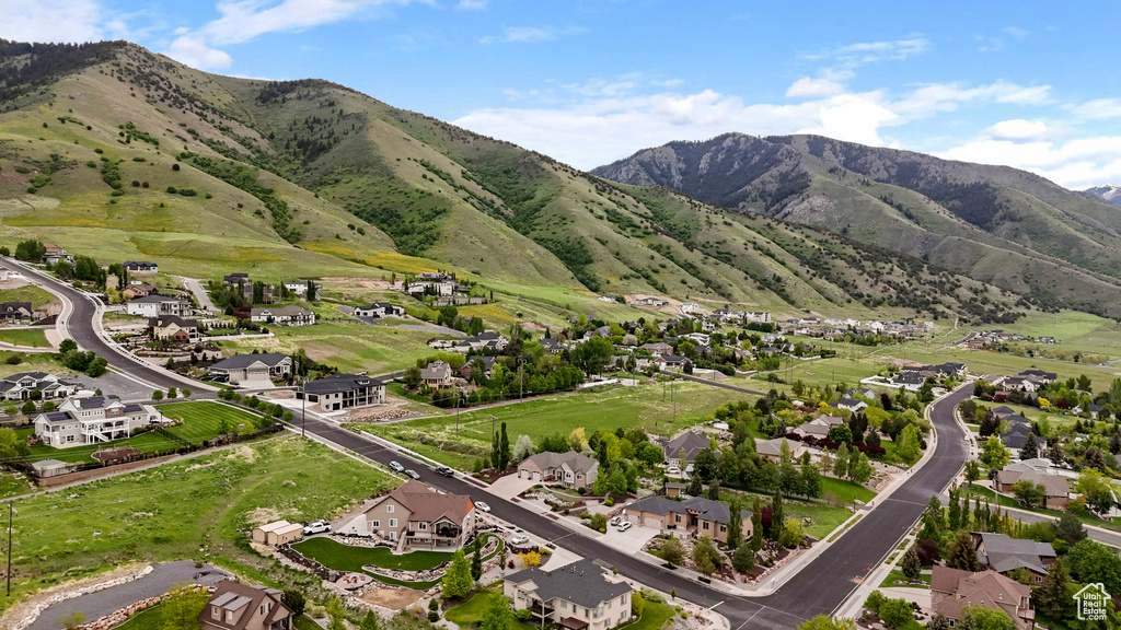 View of mountain backdrop with nearby suburban area