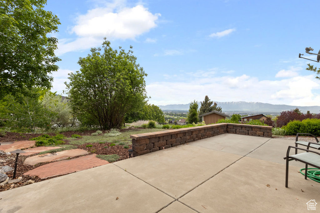 View of patio / terrace with a mountain view