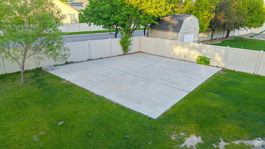 View of patio with an outdoor structure