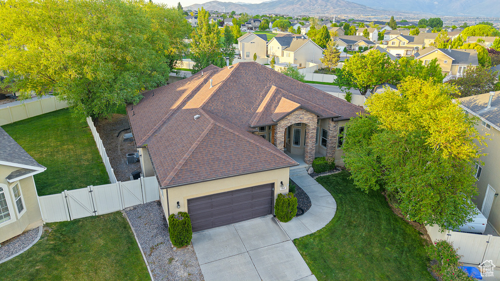 Aerial view of residential area featuring mountains