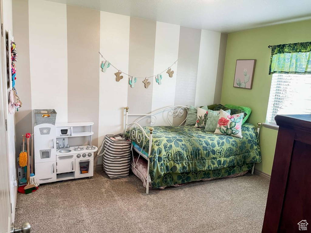 Bedroom featuring carpet flooring