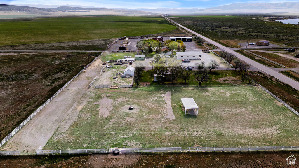 Aerial view of sparsely populated area with a mountainous background