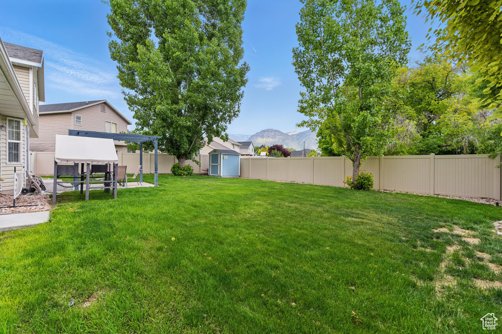 View of yard with a mountain view