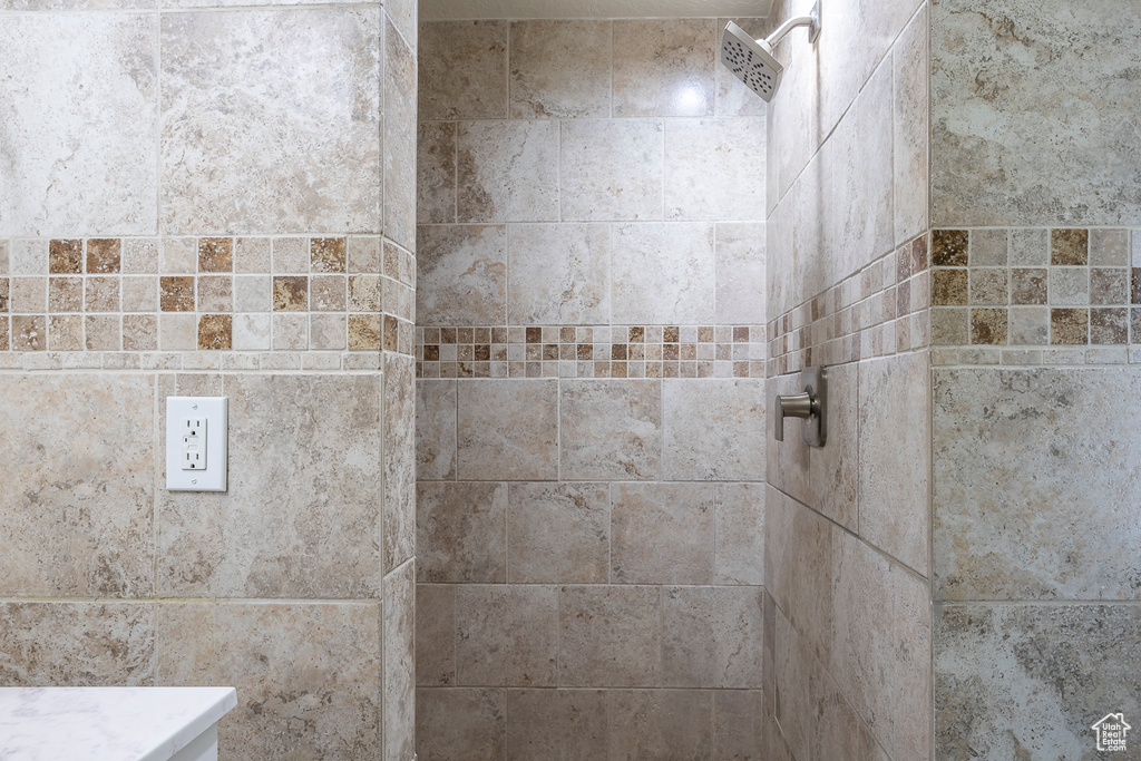 Bathroom with tiled shower