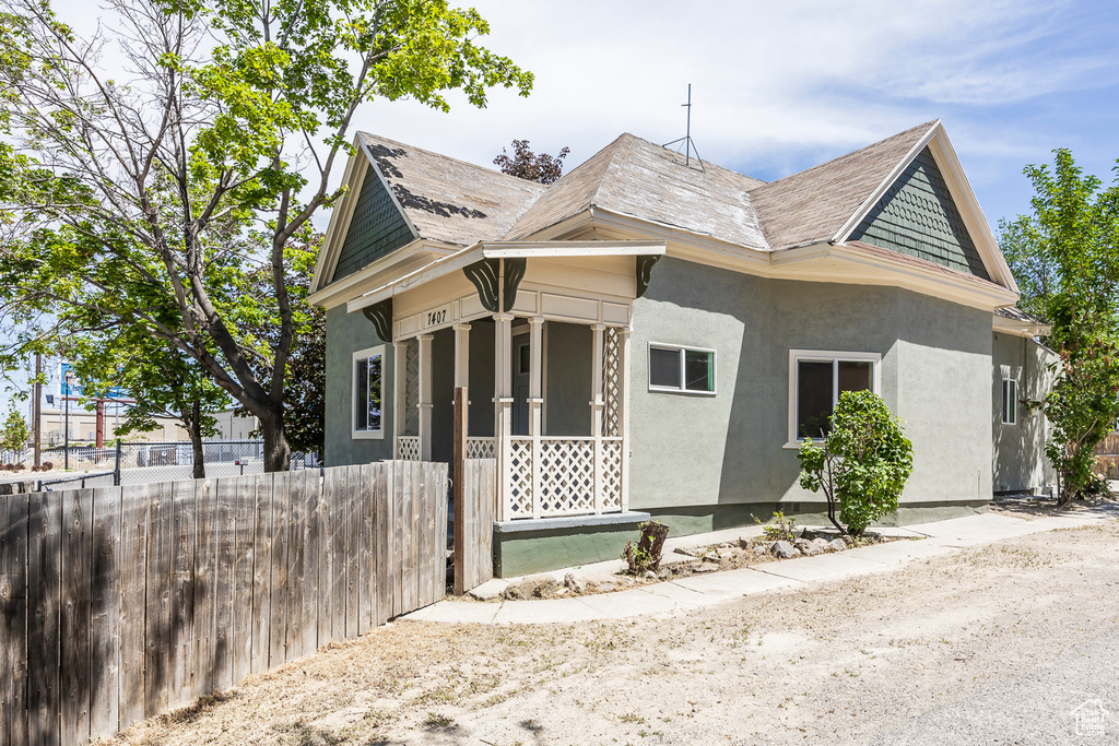 View of front facade featuring stucco siding