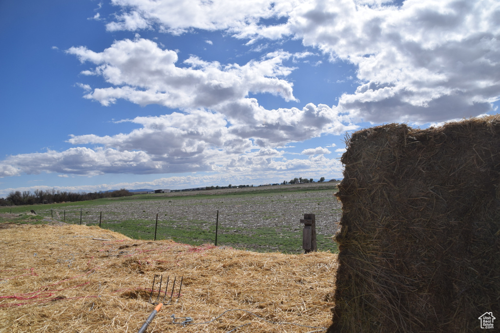 View of yard with a rural view