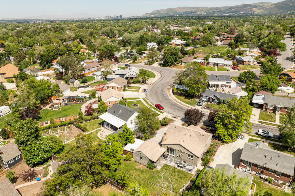Aerial view of residential area featuring mountains