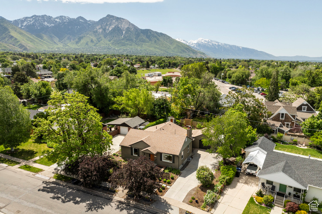 Aerial view of residential area featuring a mountain backdrop