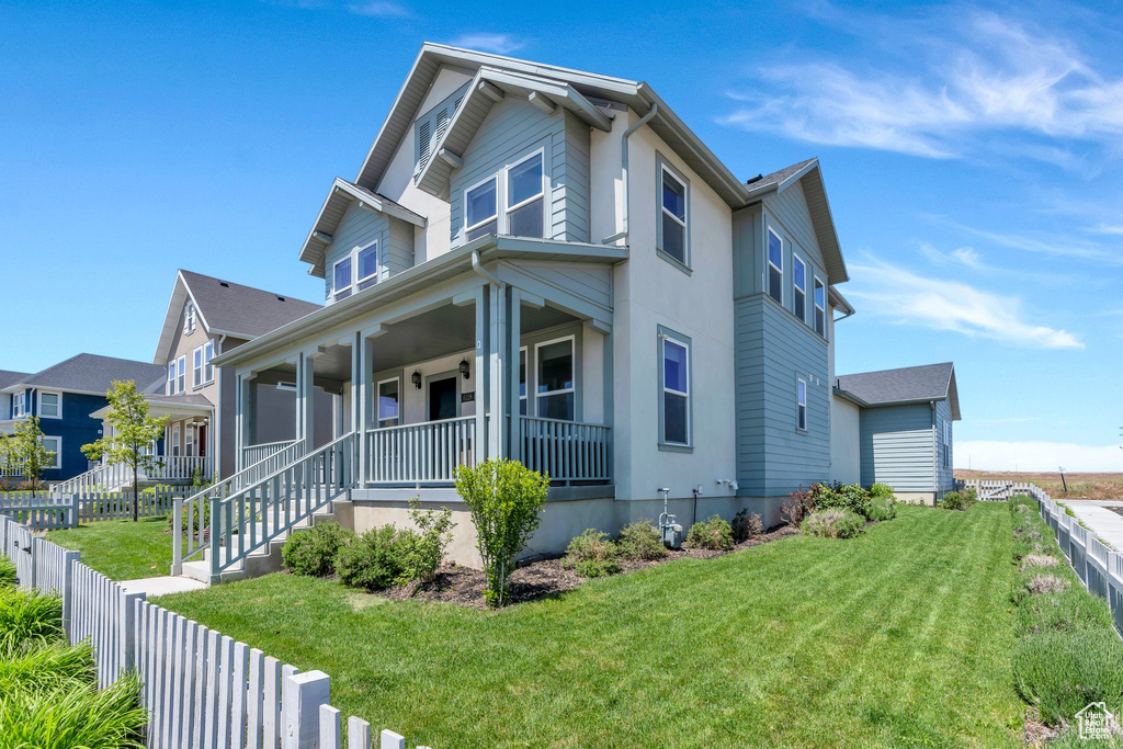 View of front of home with covered porch