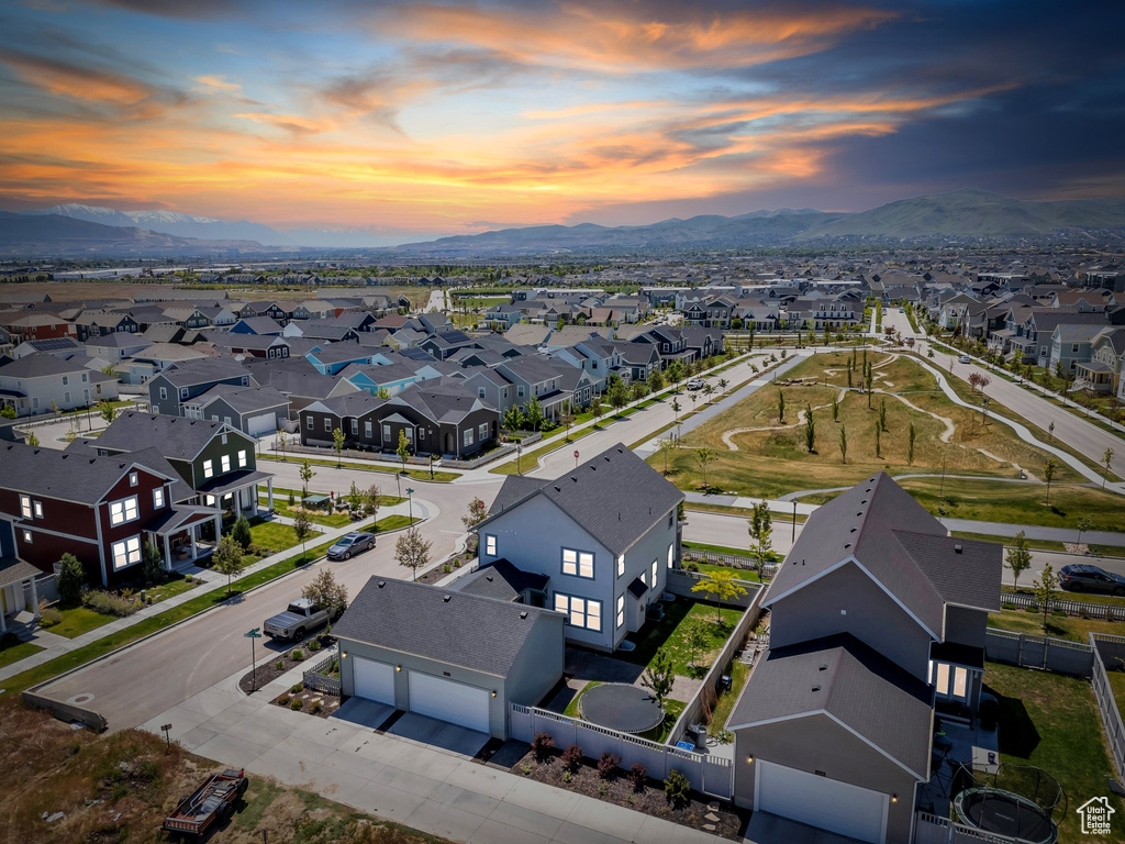Aerial view of residential area featuring mountains