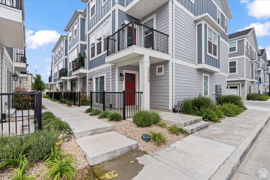 View of building exterior with a residential view