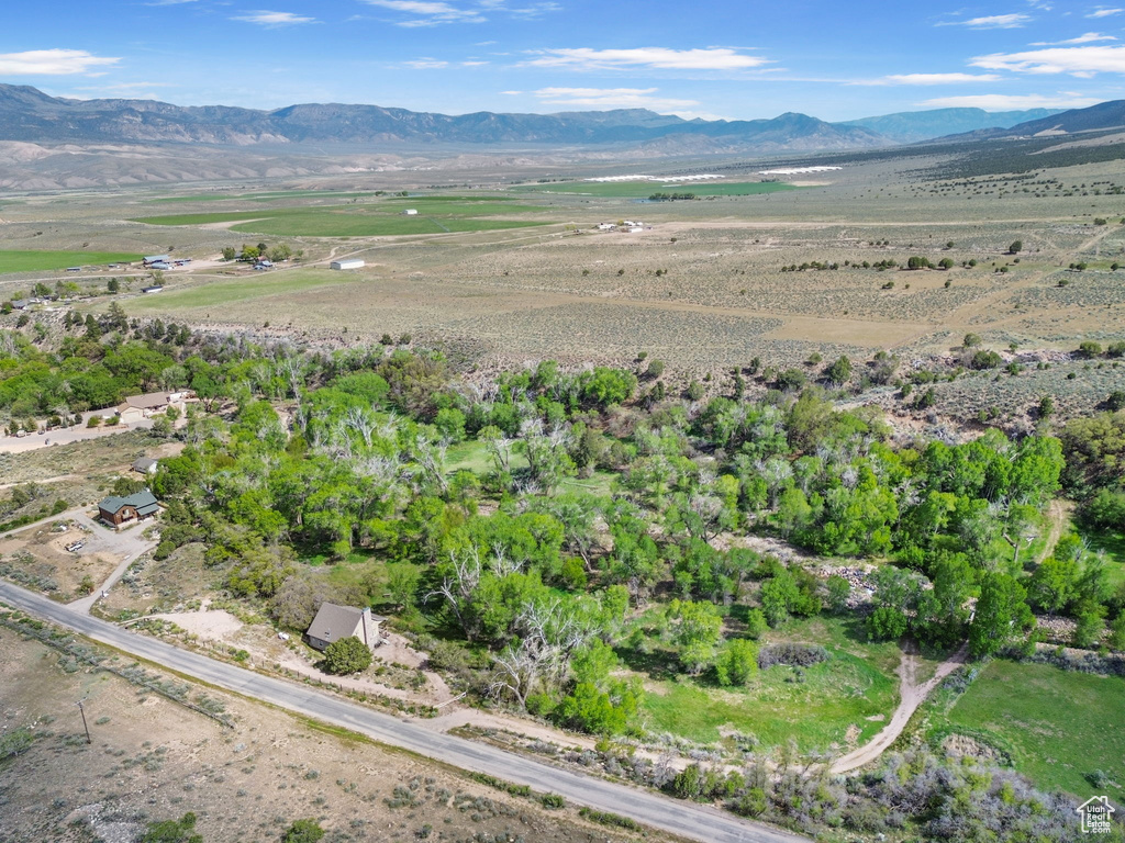 View of property location featuring mountains and rural landscape