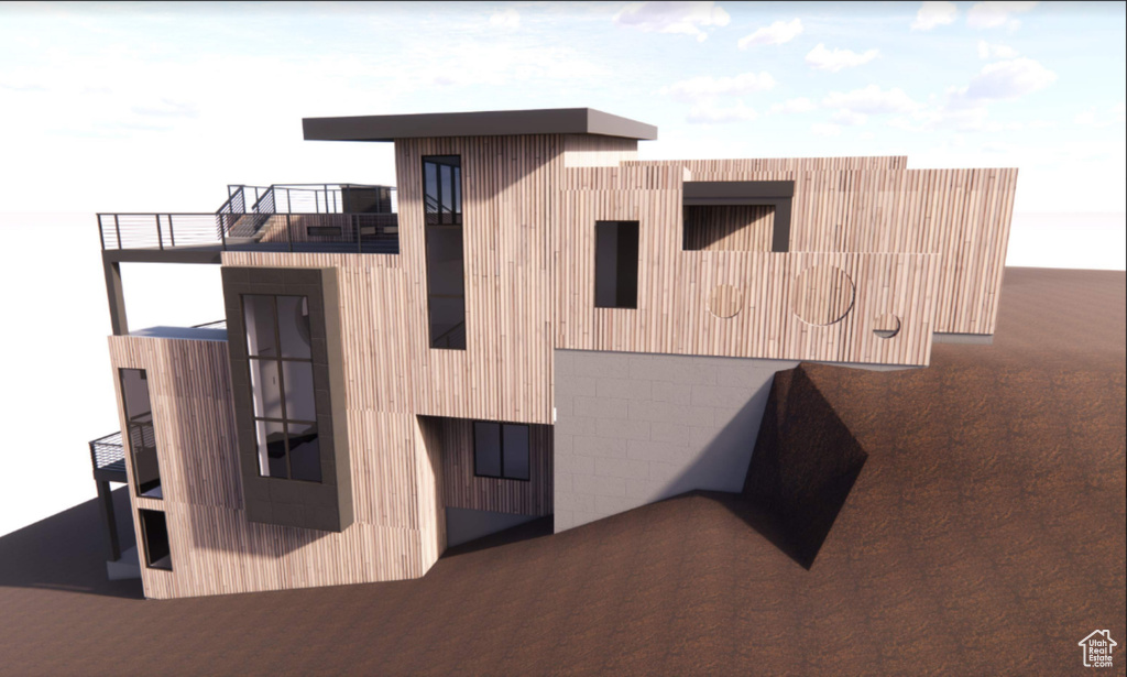 View of home's exterior featuring a balcony