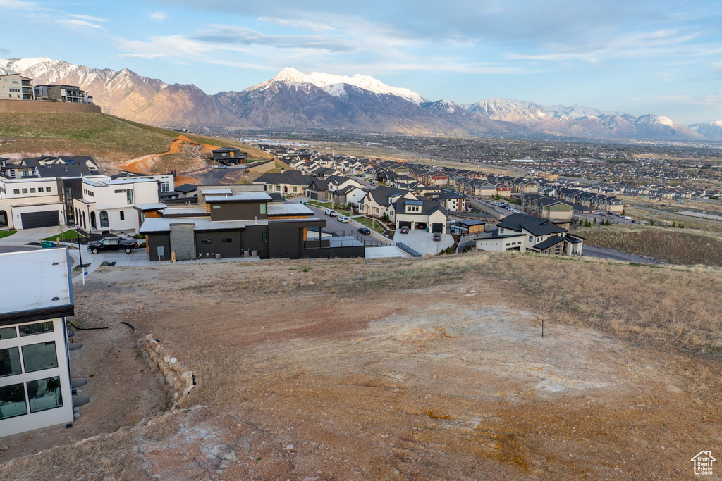 View of mountain backdrop with nearby suburban area