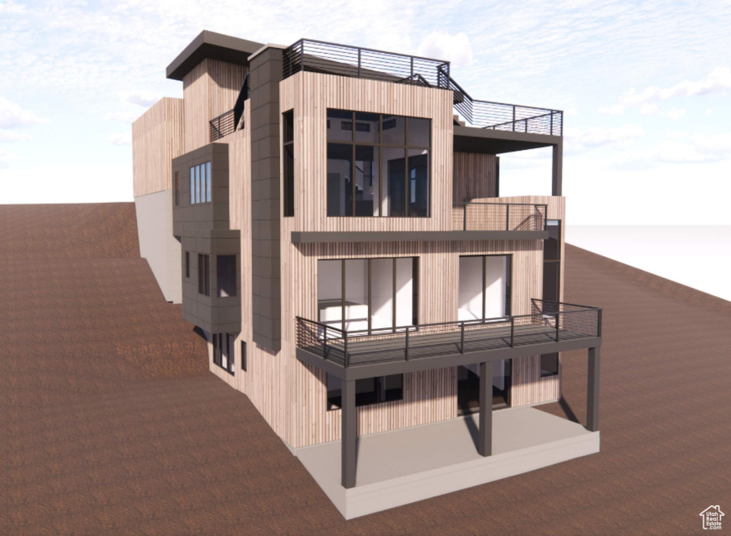 Back of house featuring a balcony
