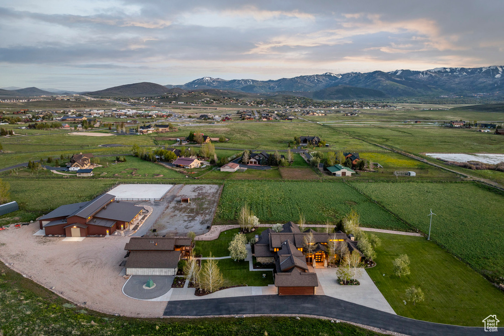 Aerial overview of property's location with mountains and rural landscape
