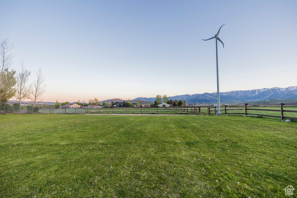 View of yard featuring a view of rural / pastoral area and a mountain view