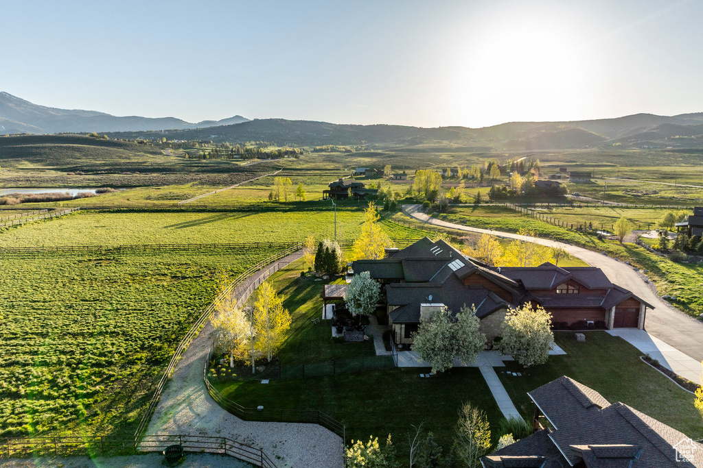 Aerial view of sparsely populated area with a mountain backdrop