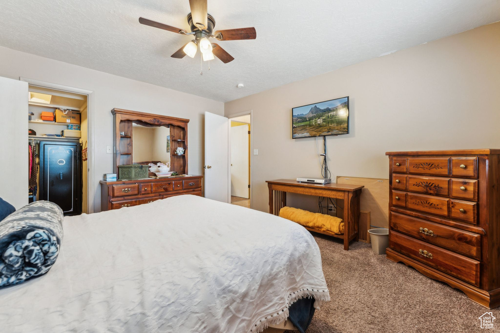 Bedroom with carpet floors and ceiling fan