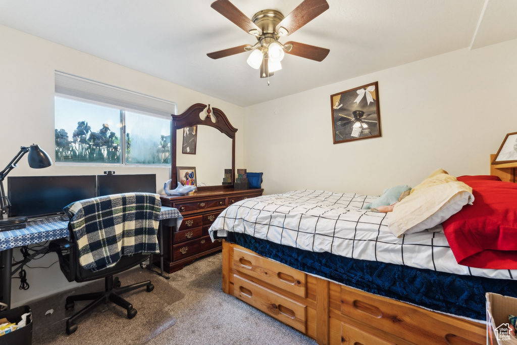 Bedroom featuring carpet flooring and a ceiling fan