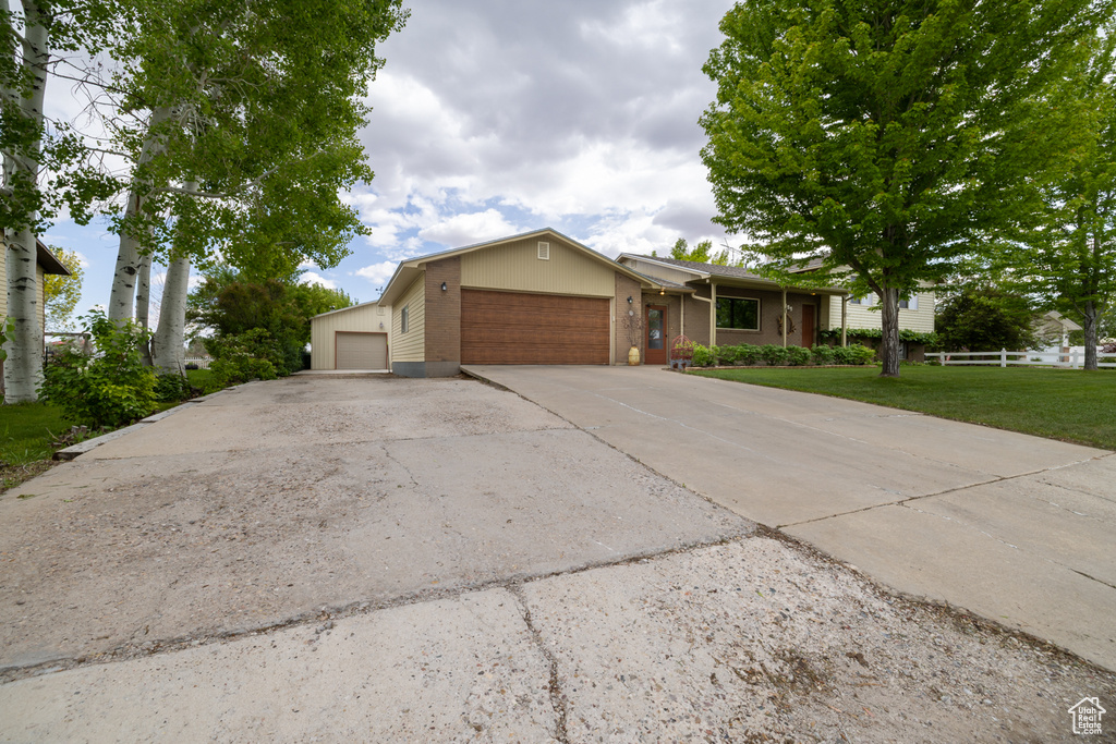 Ranch-style home featuring a garage