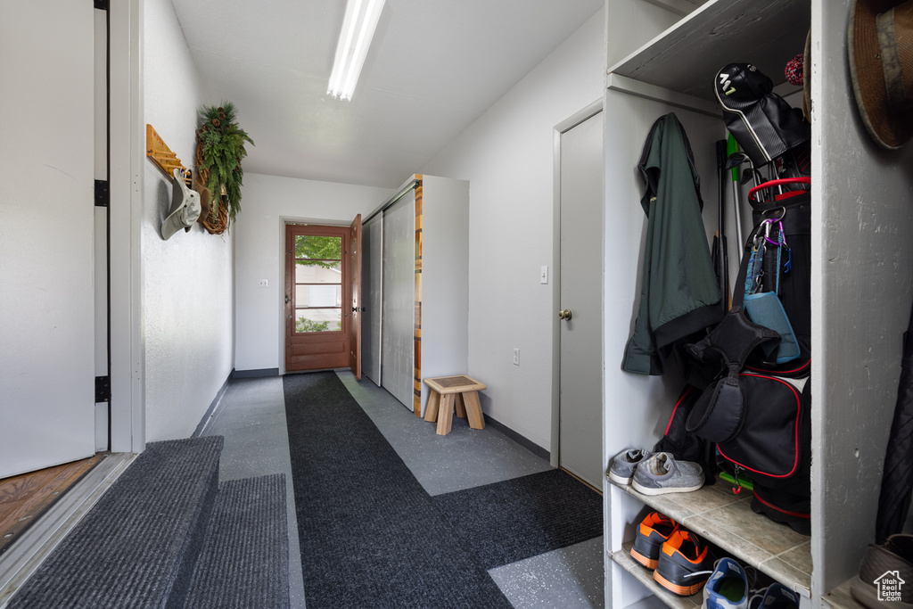 Mudroom featuring baseboards