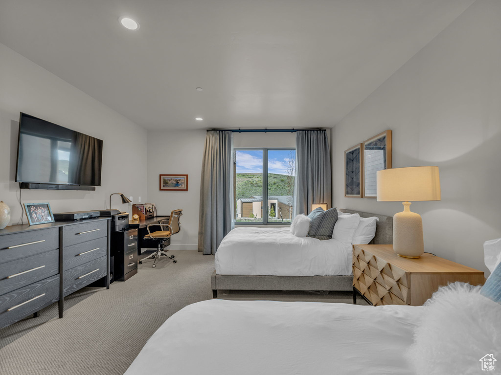 Bedroom with carpet flooring, recessed lighting, baseboards, and a desk