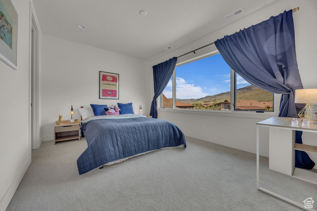 Bedroom featuring carpet