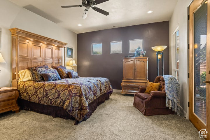 Bedroom featuring light carpet, recessed lighting, and a ceiling fan