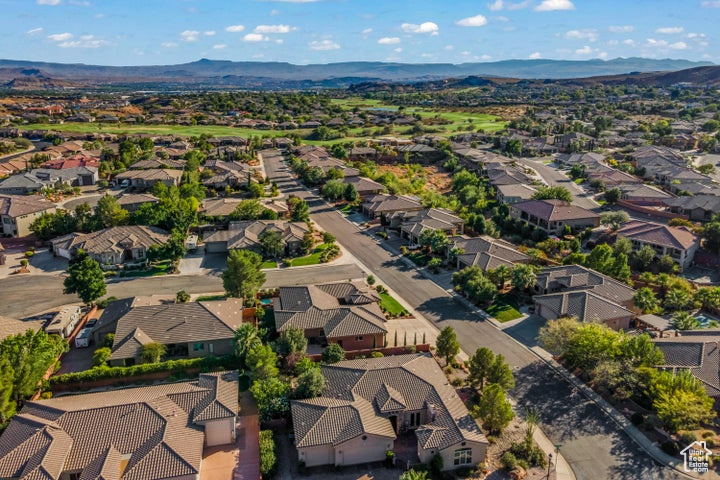 Aerial view of residential area with a mountainous background