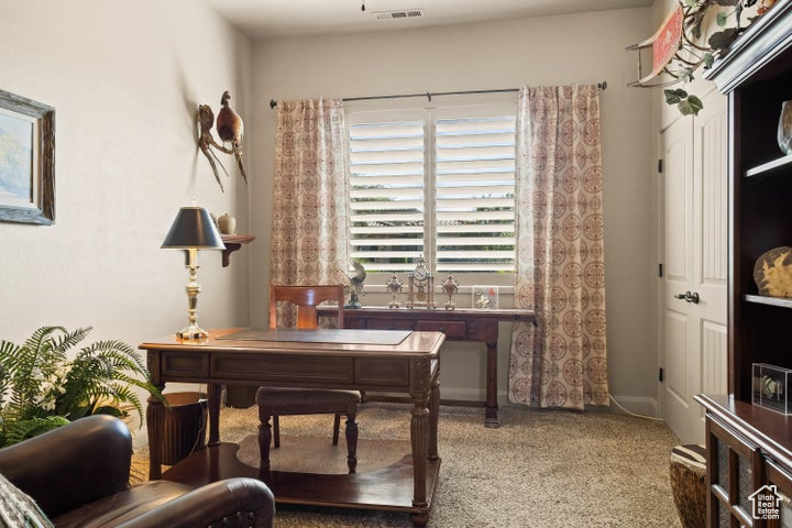 View of carpeted home office