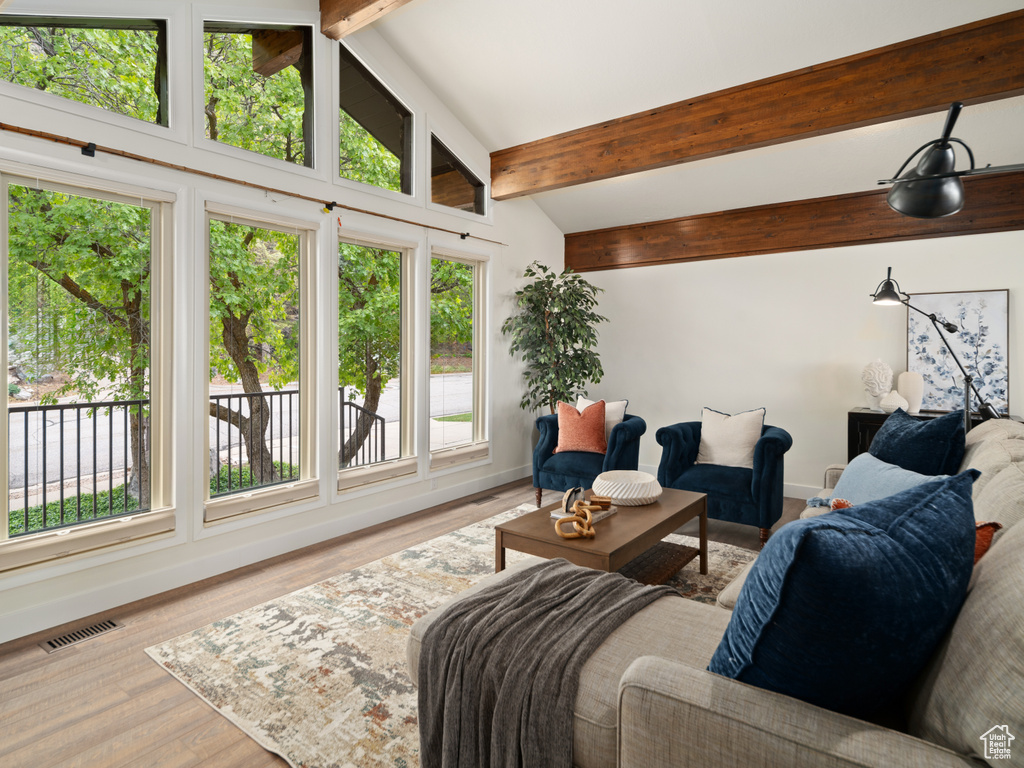Living area featuring wood finished floors and baseboards