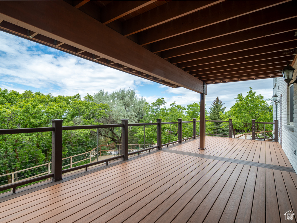 Deck with view of scattered trees