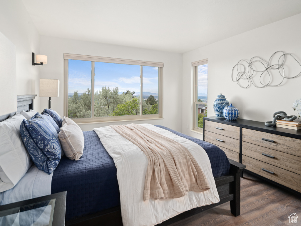 Bedroom featuring dark wood finished floors