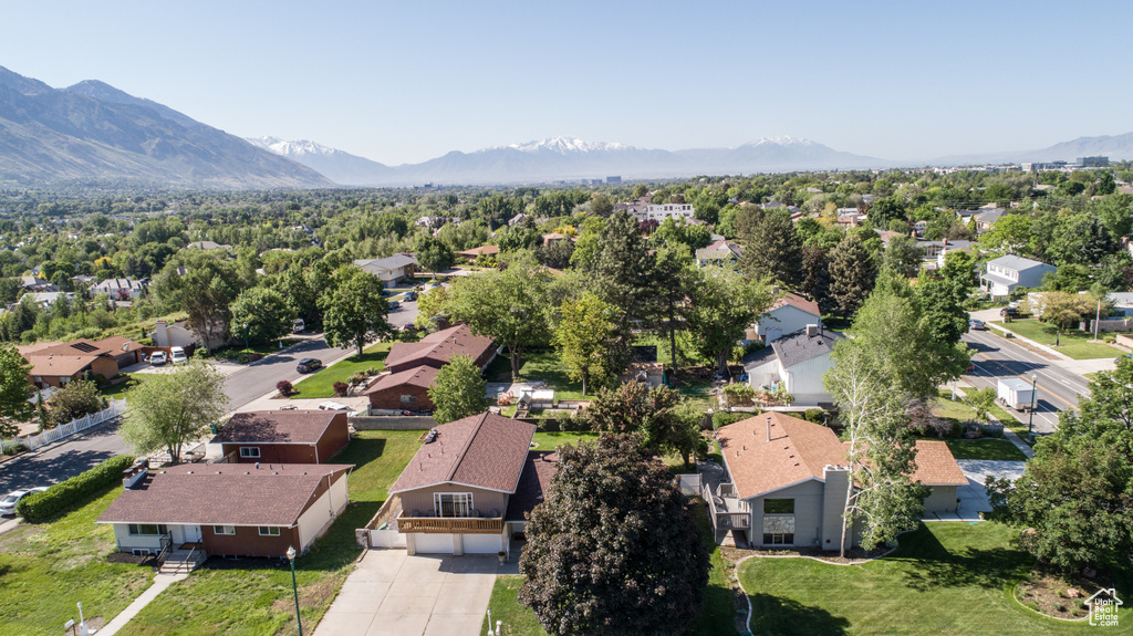 Aerial view of residential area with mountains