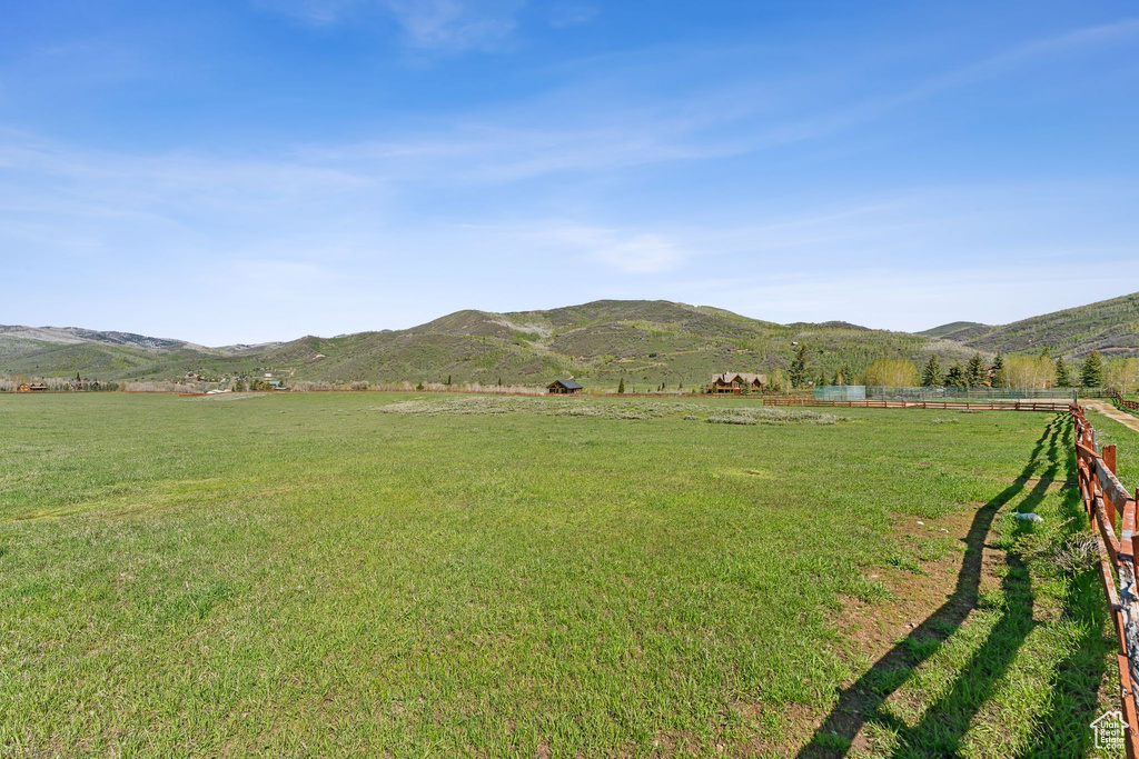 View of mountain background featuring rural landscape and agricultural land