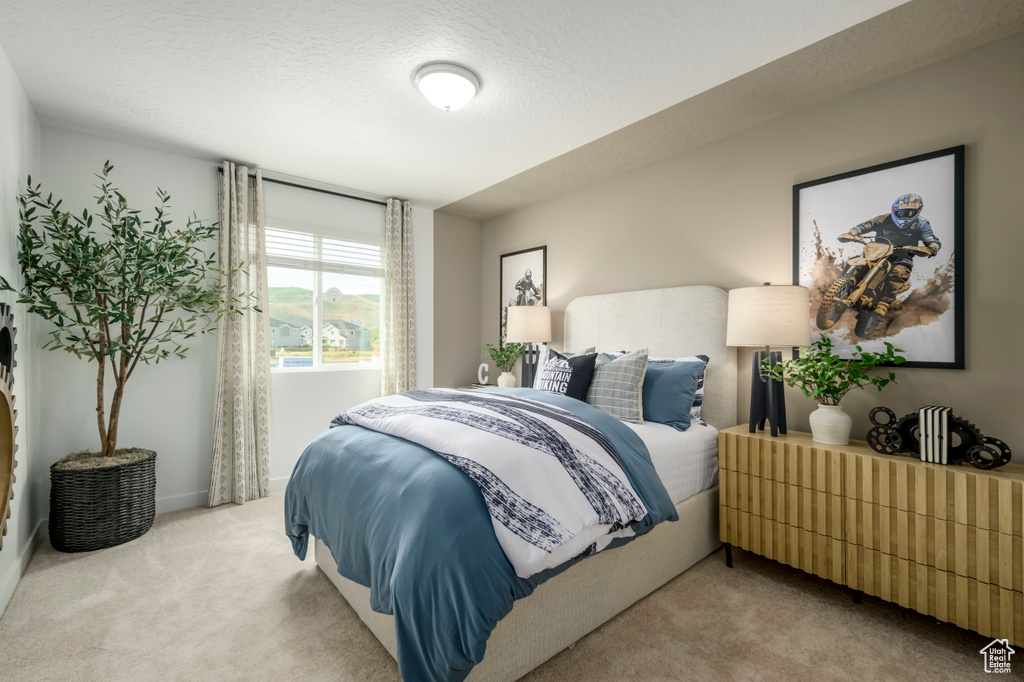 Bedroom featuring carpet flooring