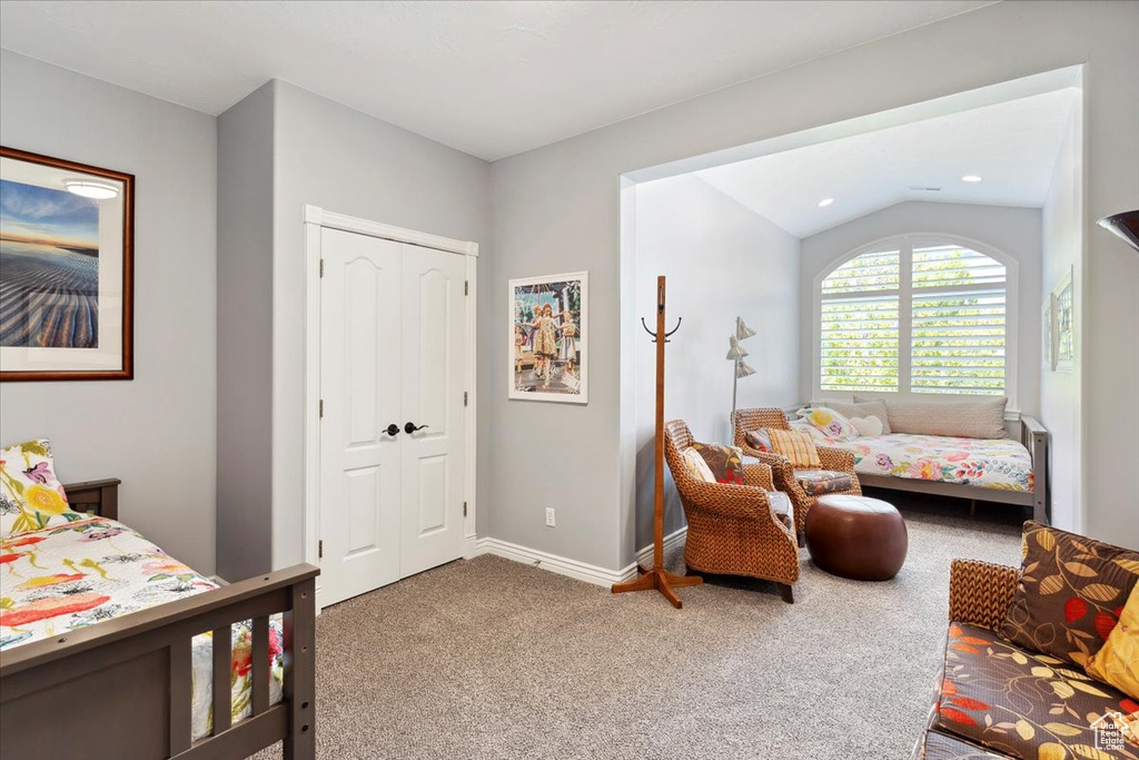 Bedroom with carpet flooring, a closet, baseboards, recessed lighting, and vaulted ceiling