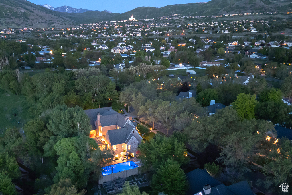 Aerial overview of property's location with a mountain backdrop