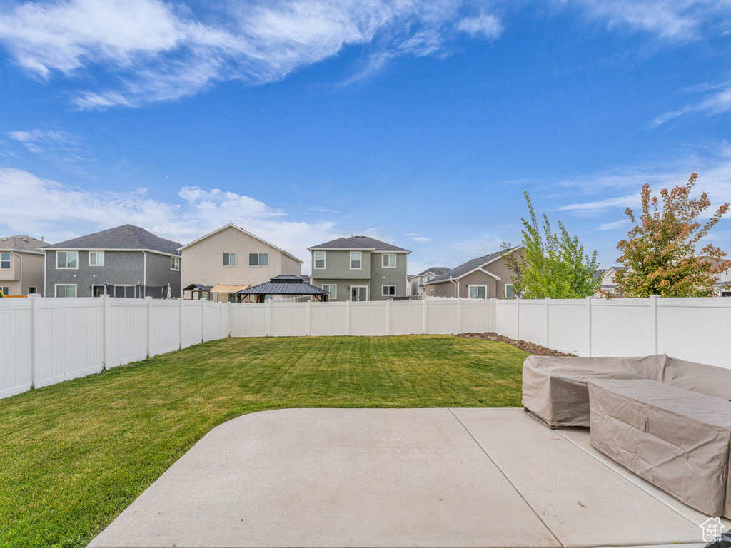 View of patio / terrace with a residential view and a gazebo