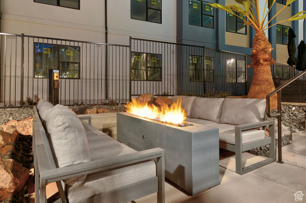 View of patio / terrace with an outdoor living space with a fire pit